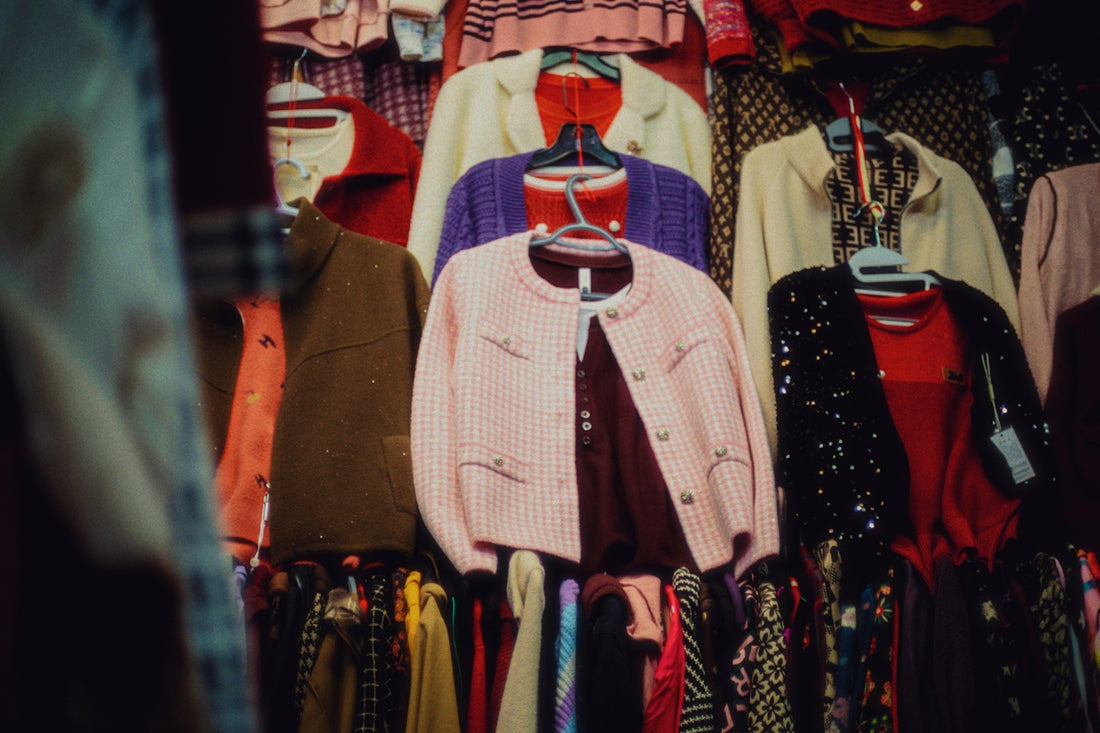 Clothing hanging on a rack for sale.