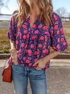 Bluză florală cu jumătate de mânecă despicată