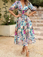 Midi -jurk met gedrukte puff mouw