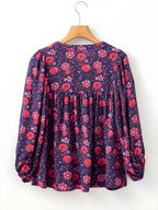 Bluză florală cu jumătate de mânecă despicată