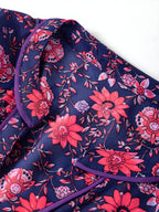 Bluză florală cu jumătate de mânecă despicată