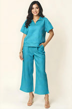 Dobbelt ta full størrelse tekstur halv glidelås korte ermet topp og bukser sett