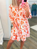 Tryckt hackad långärmad klänning