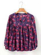 Bluză florală cu jumătate de mânecă despicată