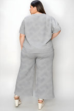 Podwójnie weź pełnowymiarowy teksturę z krótkim rękawem i zestawem spodni