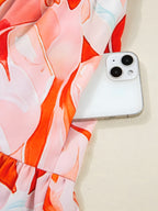 Tryckt hackad långärmad klänning