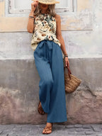 Potištěné nádrž a široké kalhoty nohou