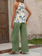 Potištěné nádrž a široké kalhoty nohou