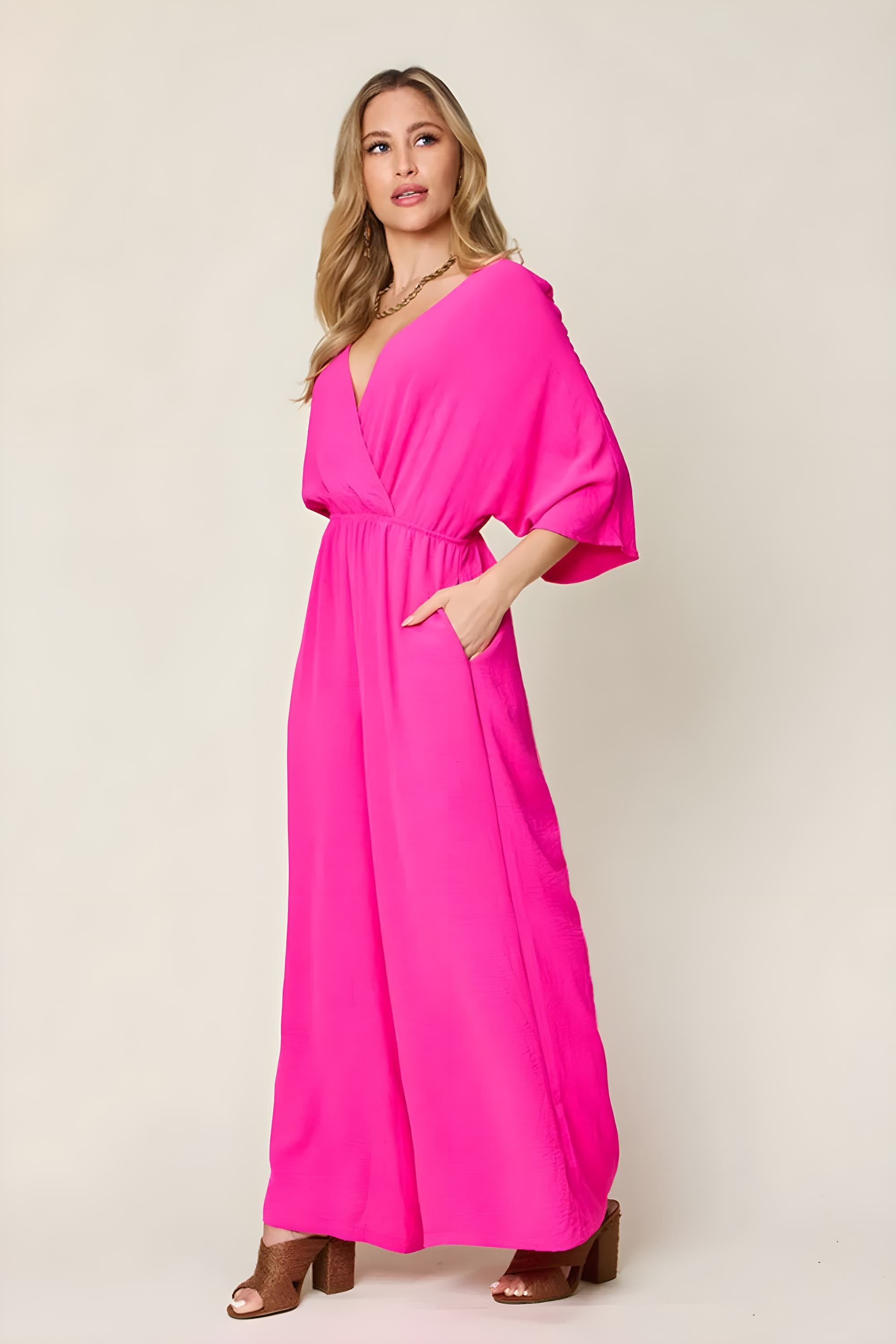 جمبسوت دبل تيك كامل الحجم بتصميم سوربليس واسع الأرجل مع جيوب