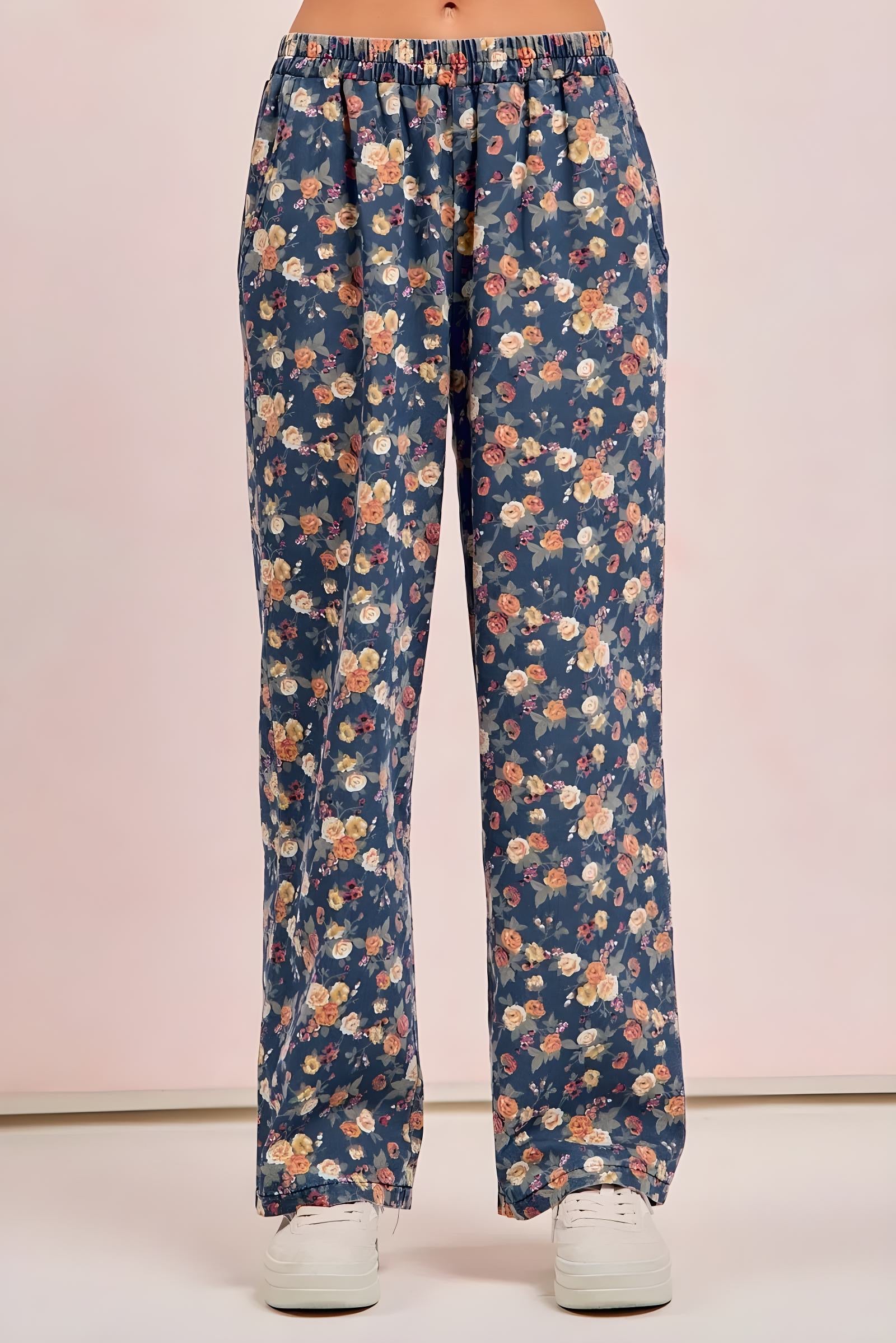 Jeans a gamba larga con stampa floreale effetto usato BiBi