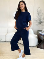 Podwójnie weź pełnowymiarowy teksturę z krótkim rękawem i zestawem spodni