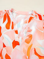 Tryckt hackad långärmad klänning