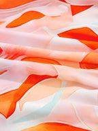 Tryckt hackad långärmad klänning