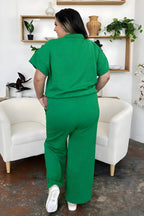 Dobbelt ta full størrelse tekstur halv glidelås korte ermet topp og bukser sett