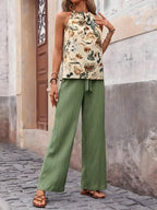 Potištěné nádrž a široké kalhoty nohou