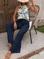 Potištěné nádrž a široké kalhoty nohou