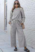 Dobbelt ta full størrelse teksturert langermet topp og snor bukser sett