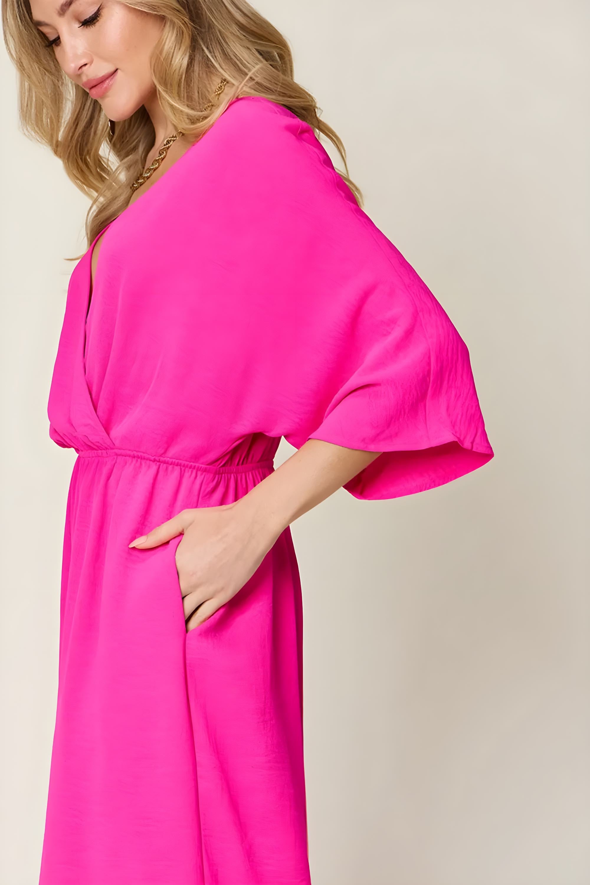 جمبسوت دبل تيك كامل الحجم بتصميم سوربليس واسع الأرجل مع جيوب